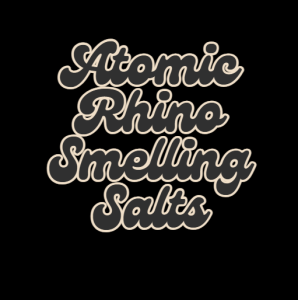Atomic Rhino Smelling Salts logo in bold, stylish cursive text on a dark background.